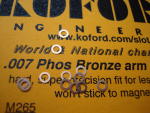 Koford Armature spacers, .007" thick, phosphor bronze. 12 pieces per package