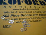 Koford Armature spacers, .003" thick, phosphor bronze. 12 pieces per package